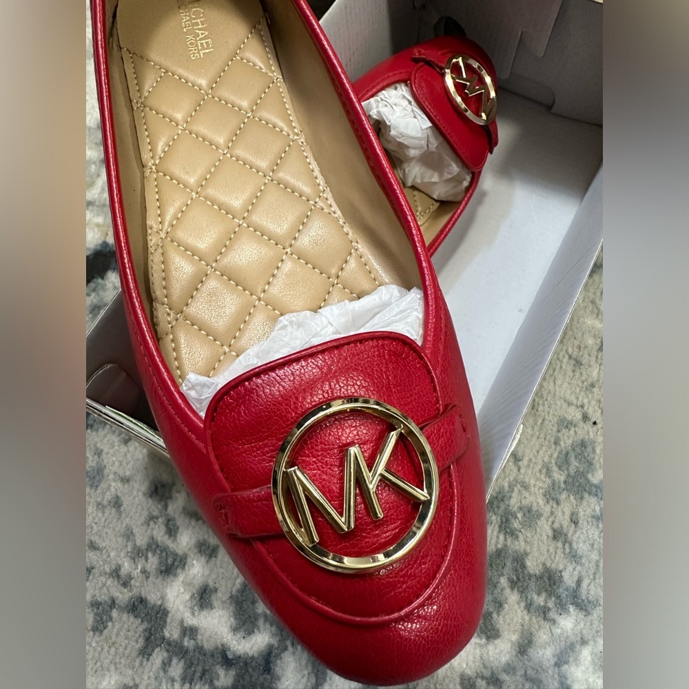 MK Micheal Kors women moccasin hot RED color. Size 9-9.5. Very Comfortable.